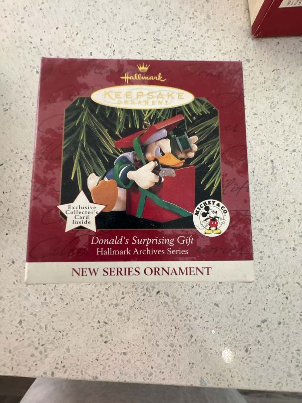 1997 Hallmark Keepsake Ornament Donald's Surprising Gift Archives Series First E
